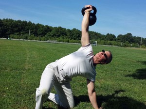 mark mellohusky kettlebell getup total body workout