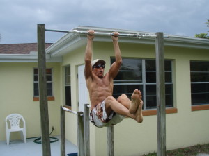 the-mango-man-on-his-pull-up-bar-in-backyard-obs-4-30-10