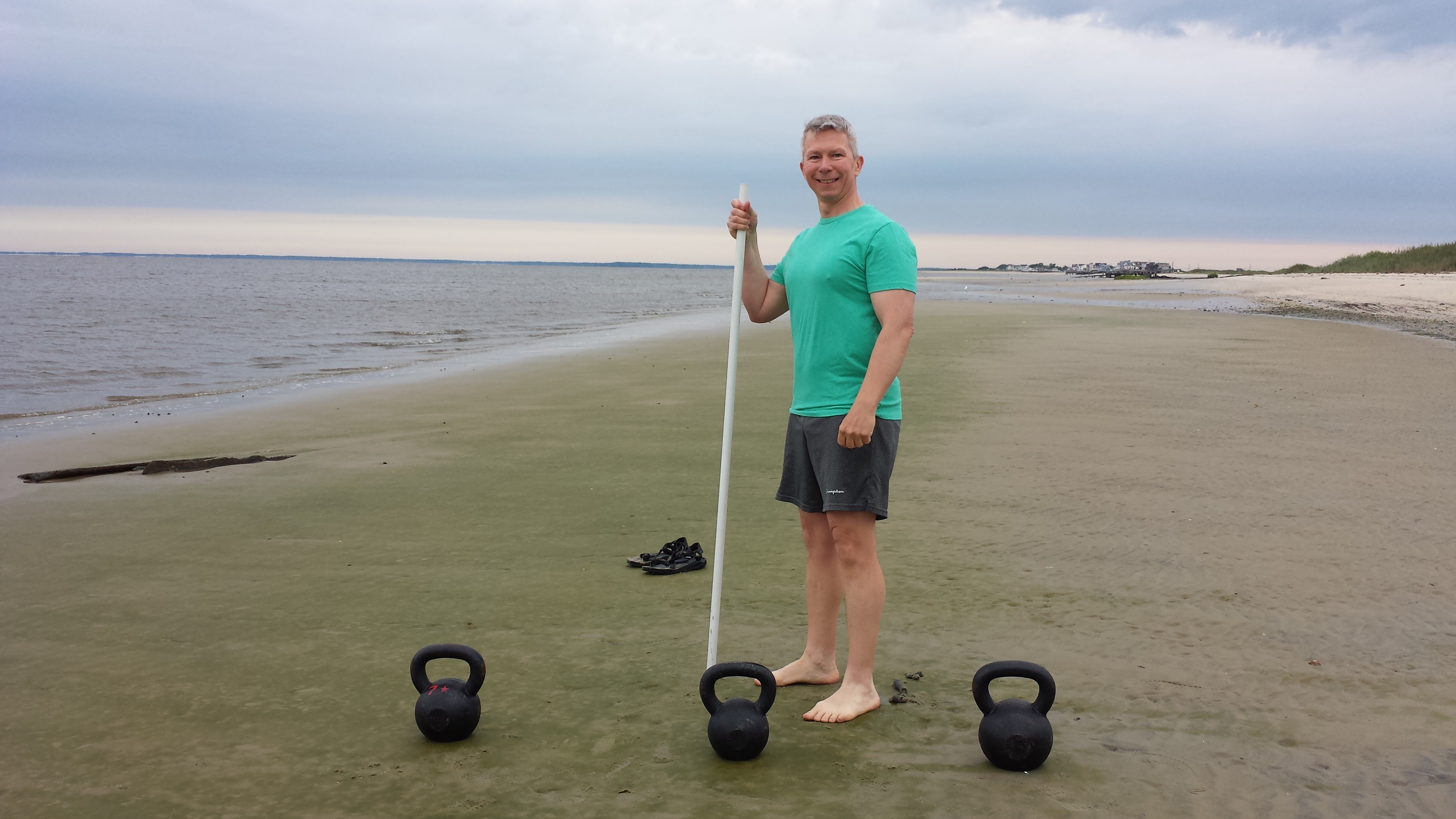 kettlebell swing total body workout mark mellohusky beach workout