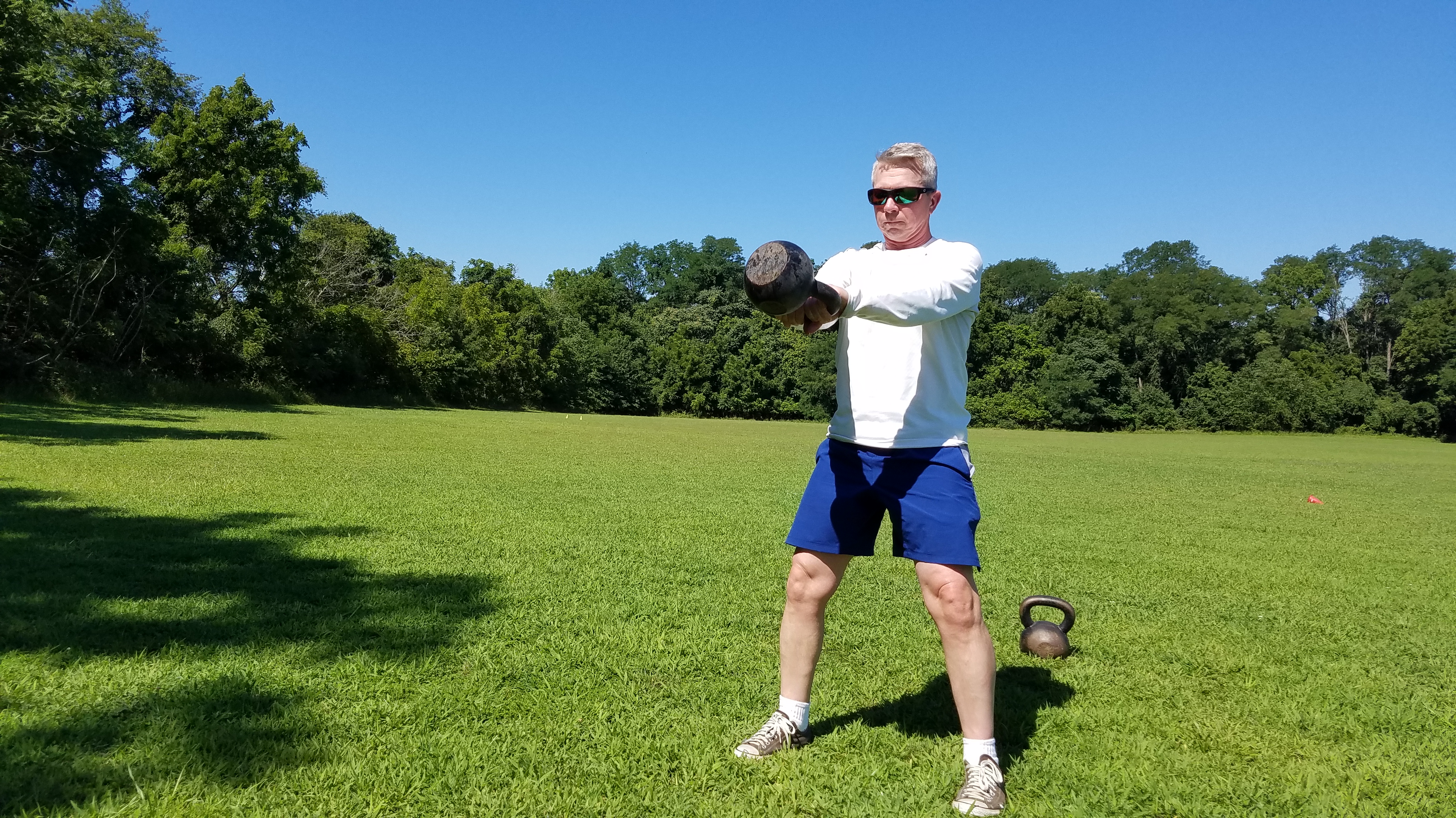 mark mellohusky kettlebell swing tutorial outdoor workout seven stars fitness