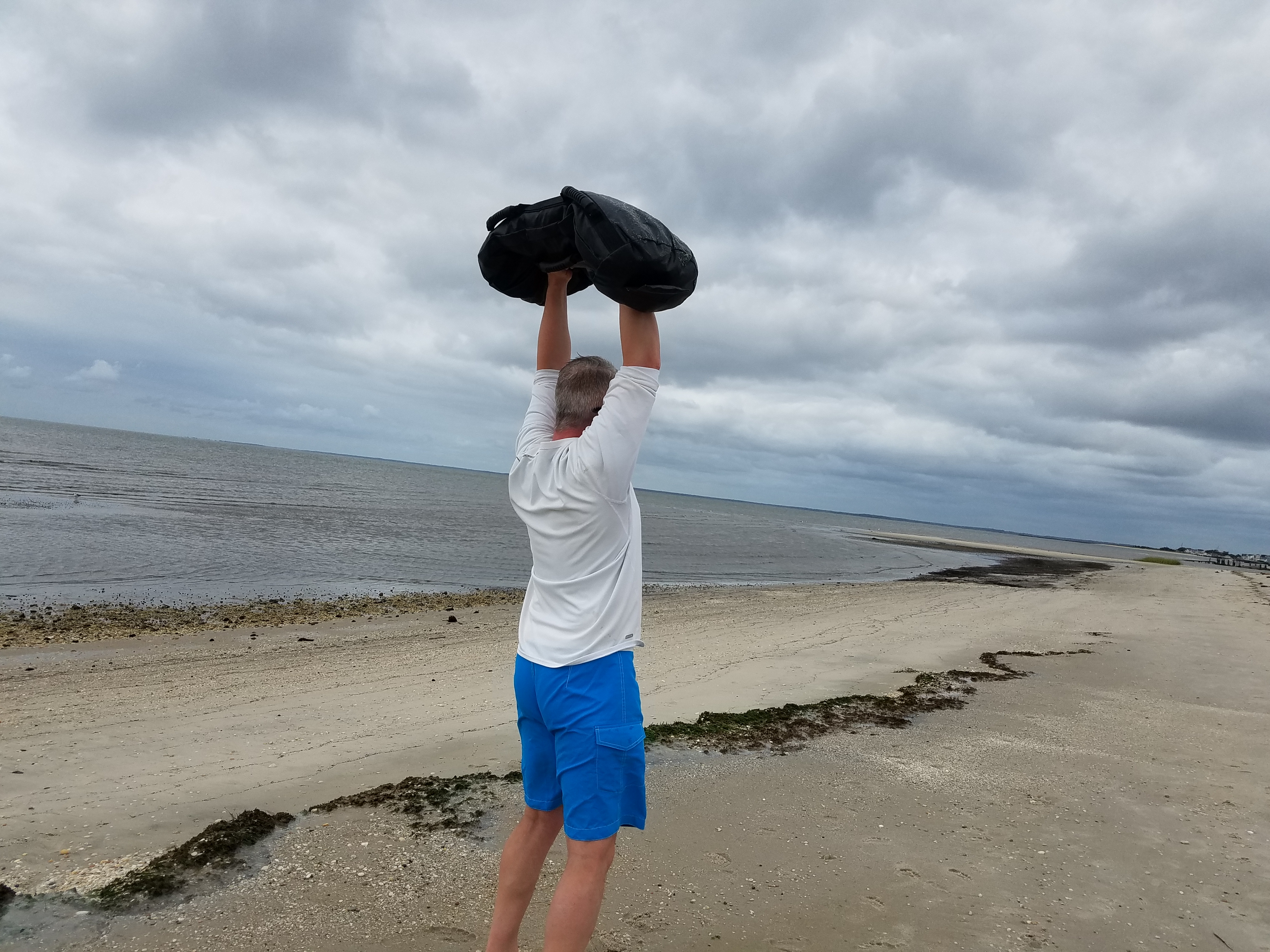mark mellohusky farmers walk overhead carry beach workout ultimate sandbag